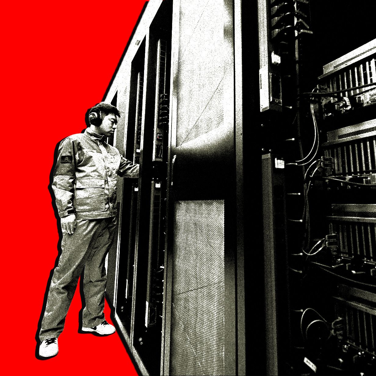 A technician in work clothes stands in front of large server equipment with a red background.