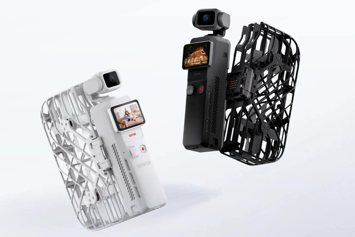 Dos drones modulares HoverAir Versa mostrados lado a lado: uno blanco con alas extendidas en la izquierda y uno negro sin alas en la derecha, ambos con cámaras acopladas en la parte superior.